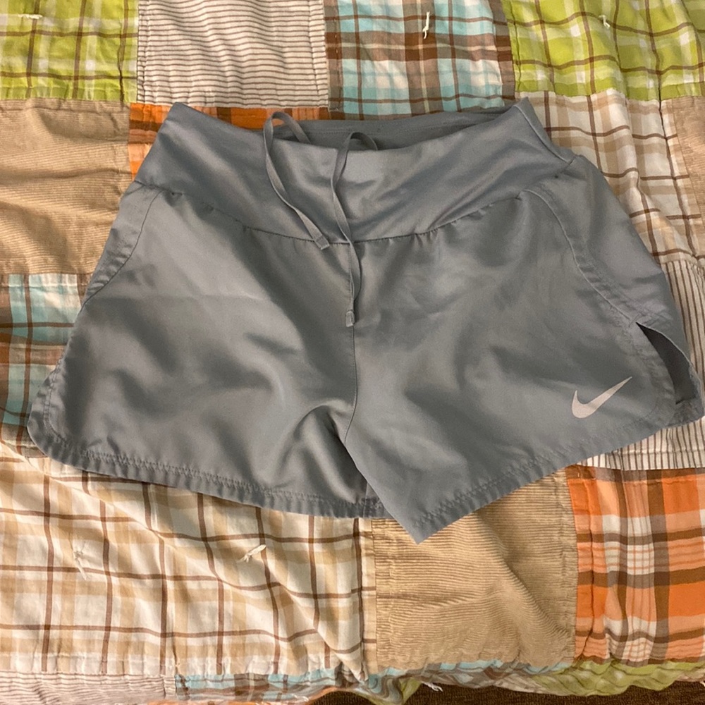 Light grey nike running shorts